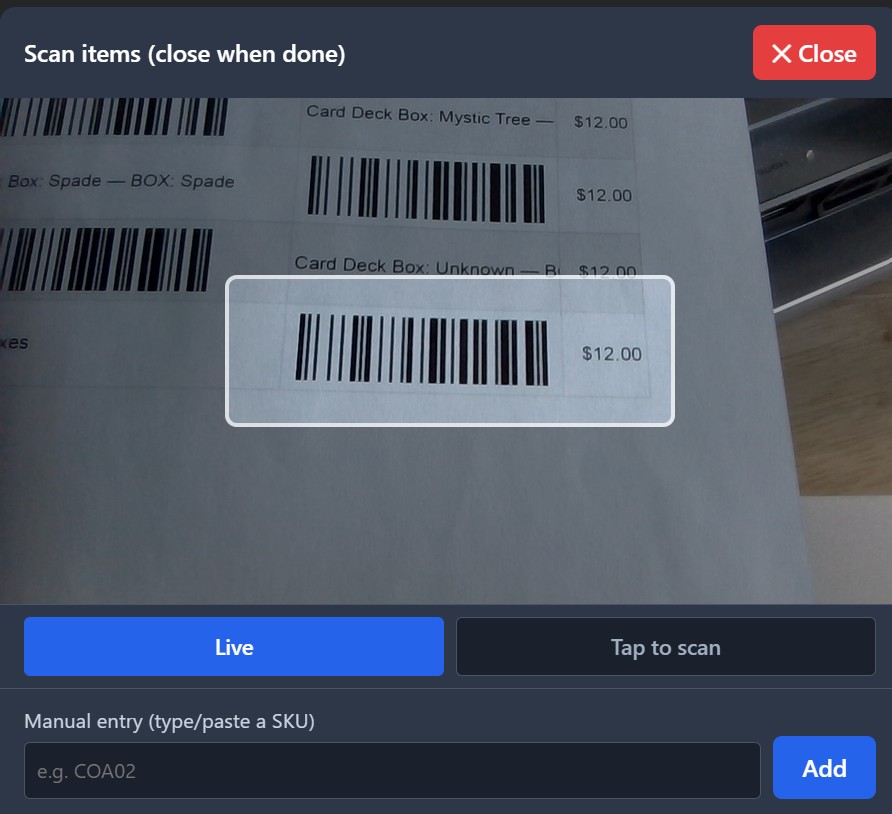 Sale view with the scanner overlay open showing the camera viewfinder